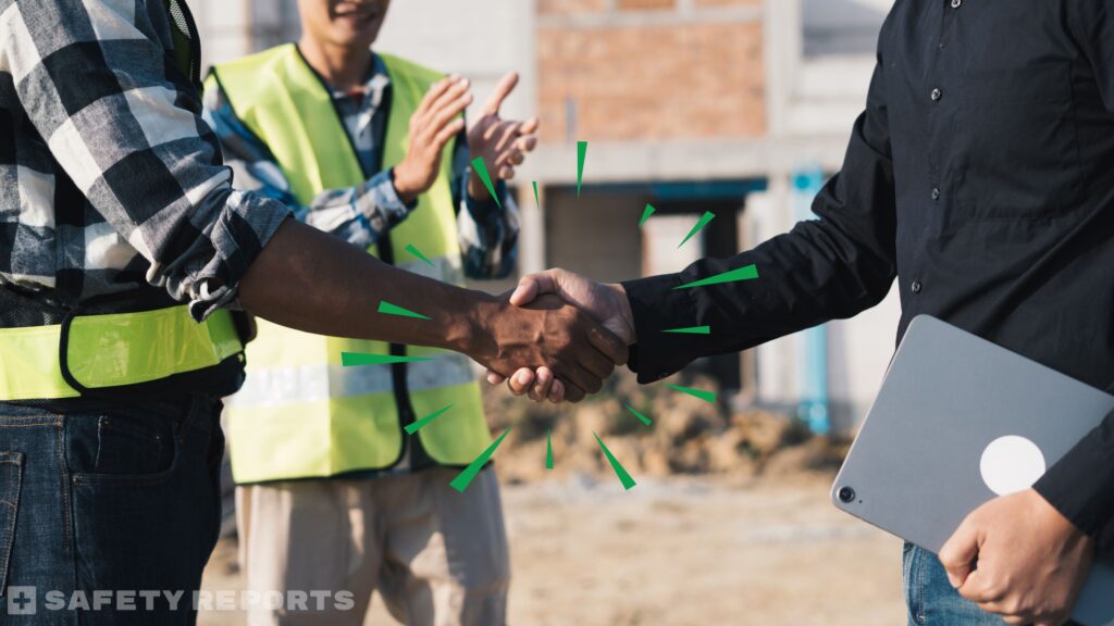 construction workers shaking hands